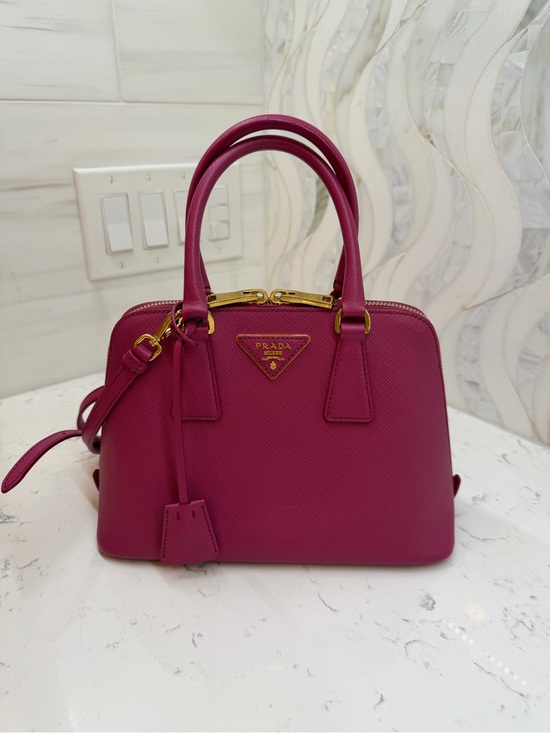 Prada Handbags - Prada Magenta Saffiano Mini Pyramid Bag with Gold Hardware. Excellent pre-loved.